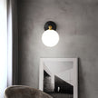 Brass Milk Glass Globe Wall Sconce