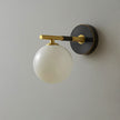 Brass Milk Glass Globe Wall Sconce