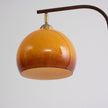 Calvrane Brass Arc Glass Globe Floor Lamp