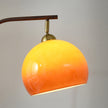 Calvrane Brass Arc Glass Globe Floor Lamp
