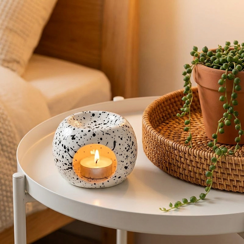 Speckled ceramic tealight holder lifestyle