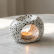 Speckled ceramic tealight holder close-up
